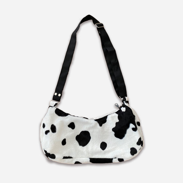 Cow shop print clutch